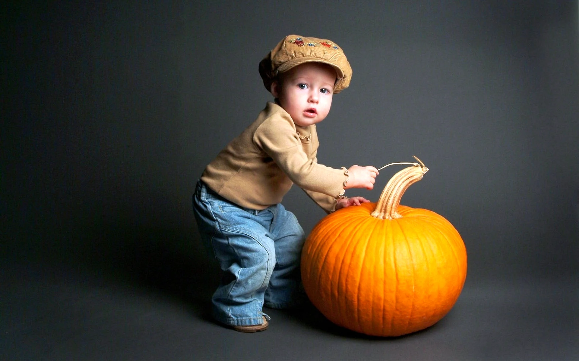 Baby With Pumpkin Wallpaper