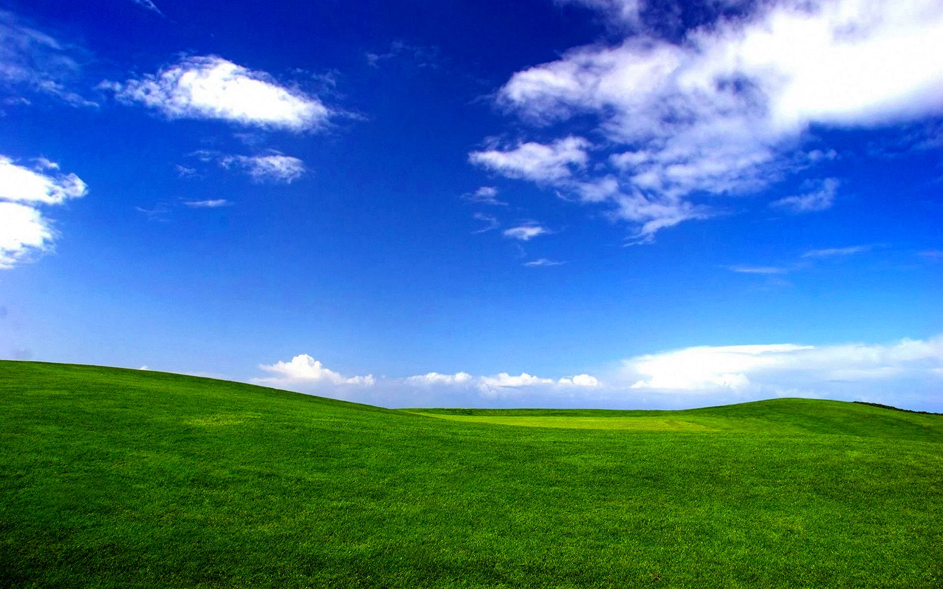 Green Hills And Sky Wallpaper