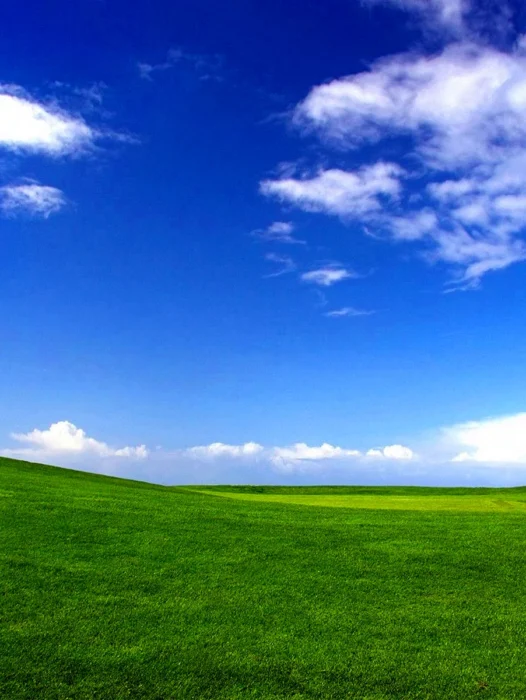 Green Hills And Sky Wallpaper