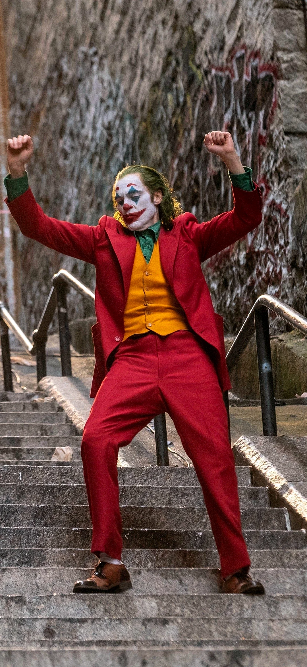Joaquin Phoenix In Joker Wallpaper for iPhone 12 mini
