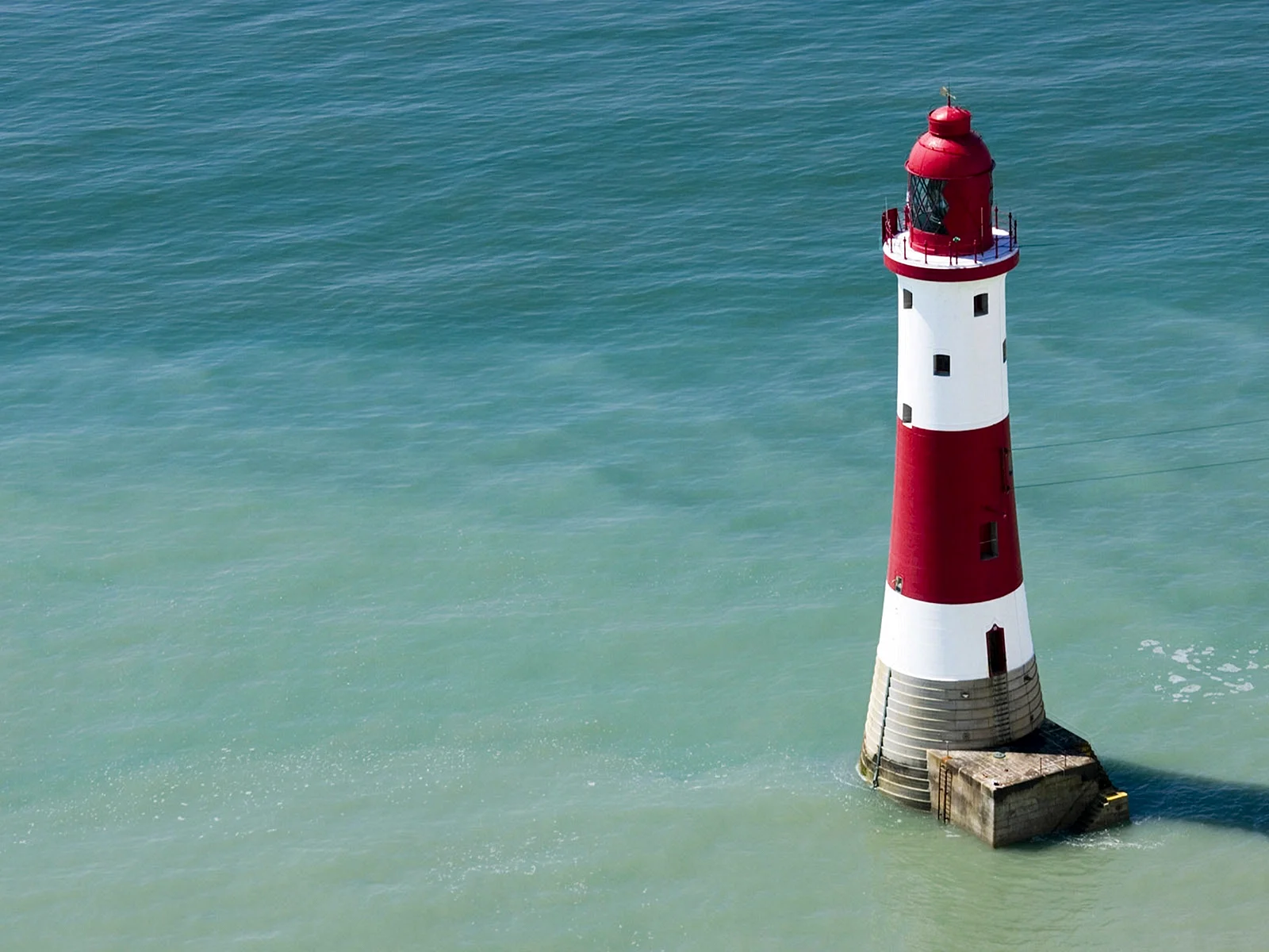 Lighthouse In The Sea Wallpaper