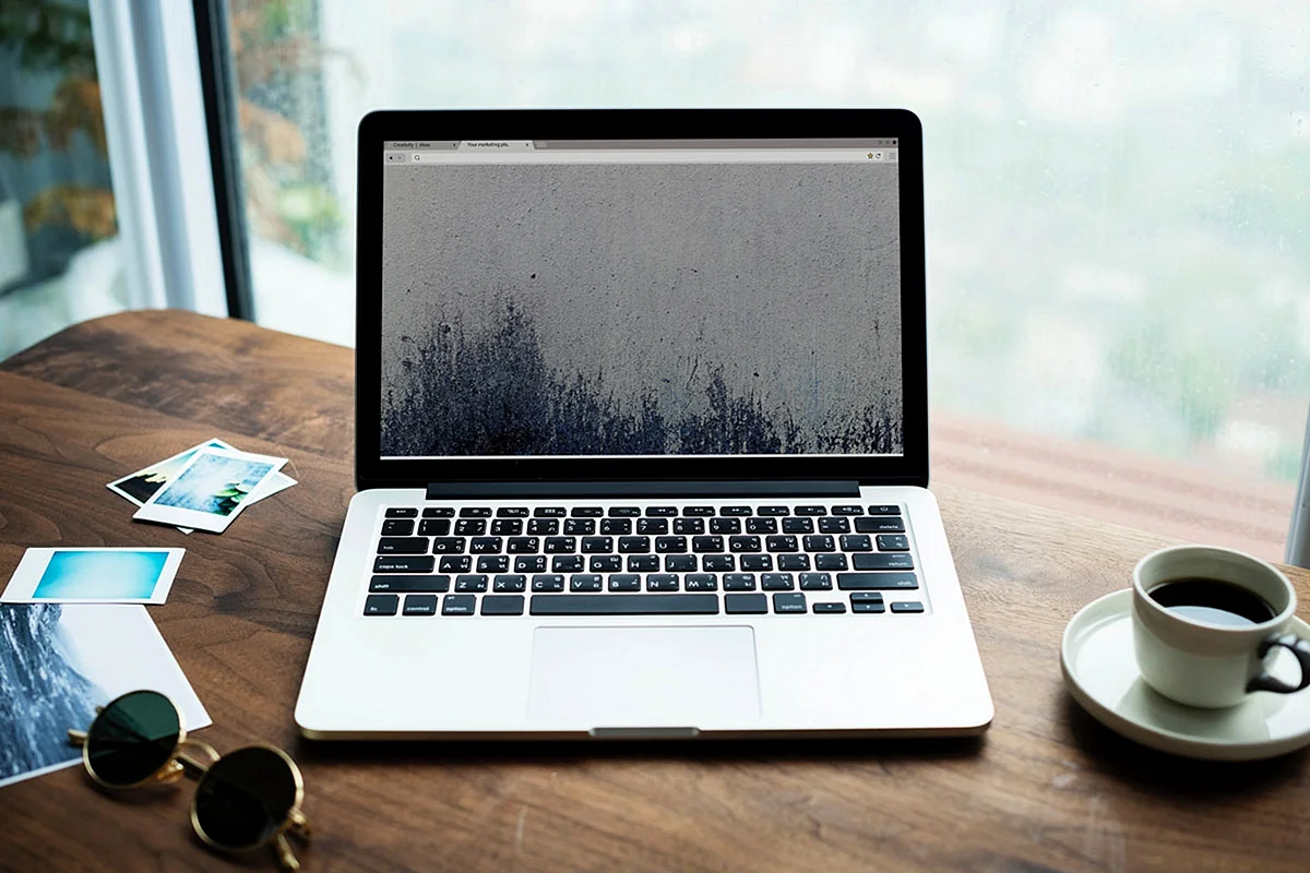 Macbook On Table Wallpaper