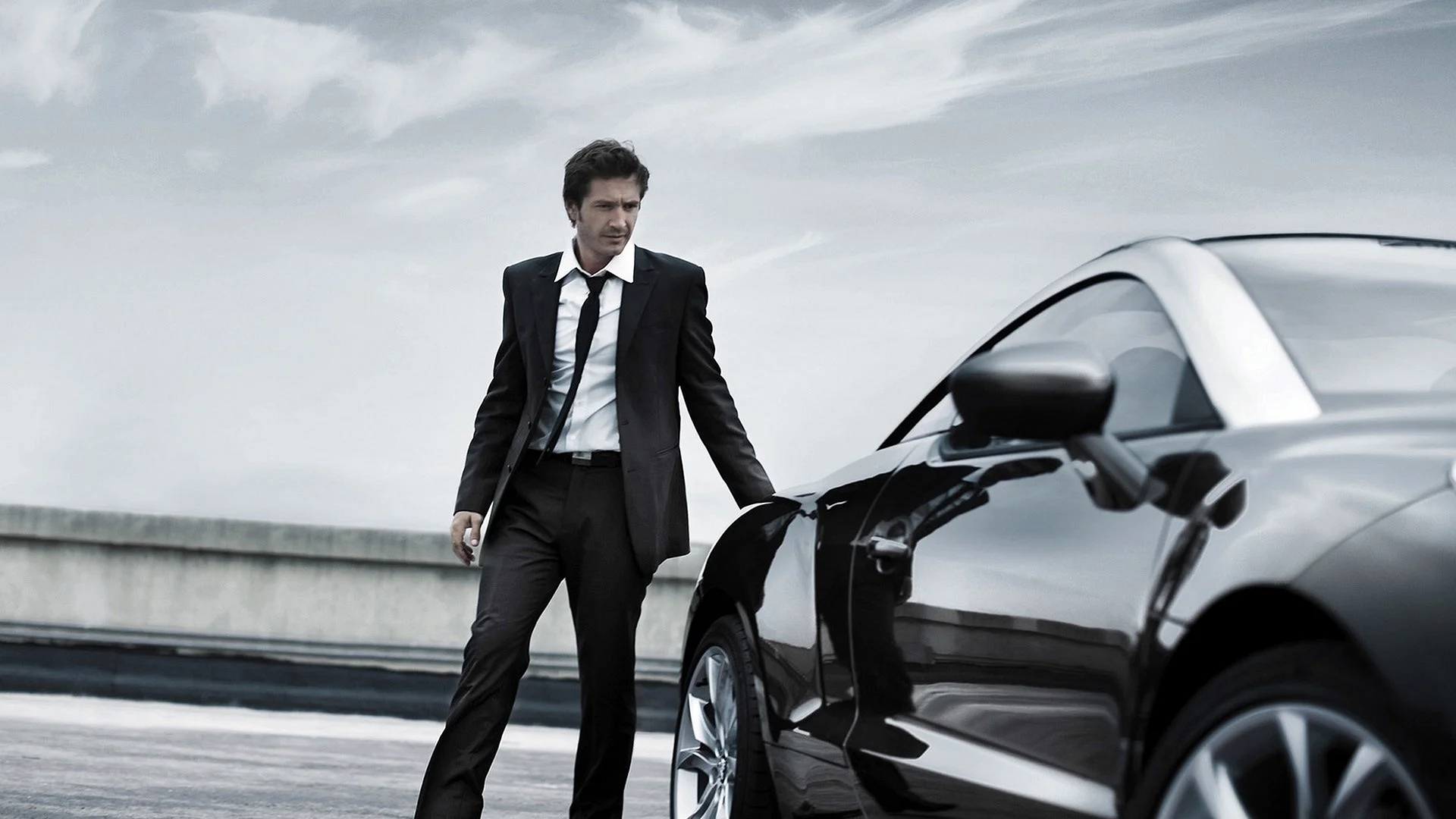 Man In Luxury Car Wallpaper