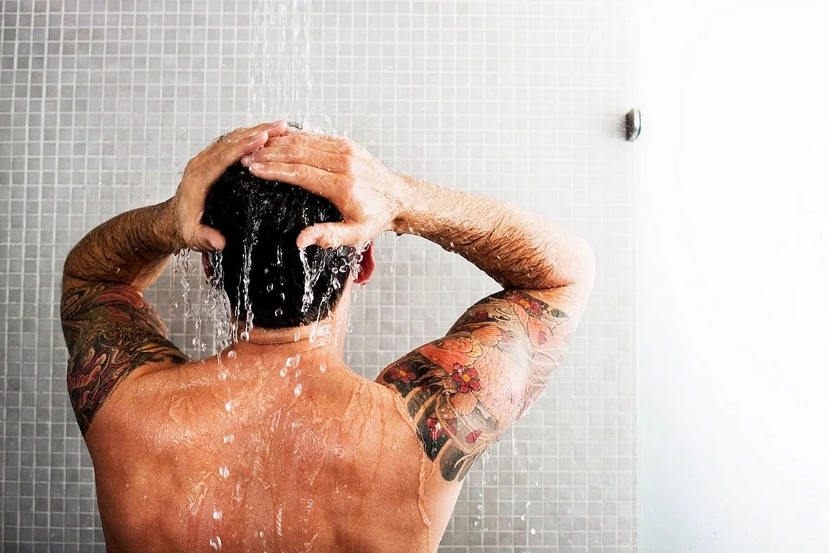 Man Taking Shower Wallpaper