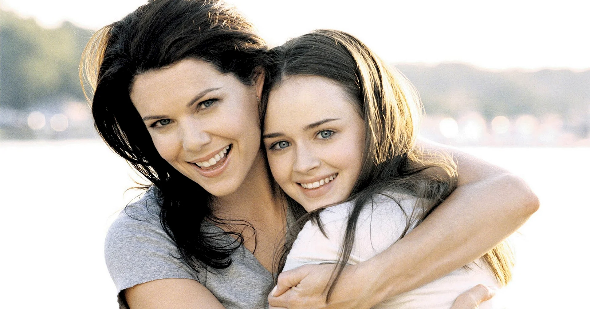 Mother And Daughter Photo Frame Wallpaper