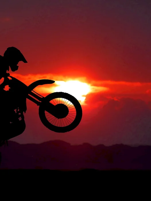 Moto silhouette Sunset Wallpaper