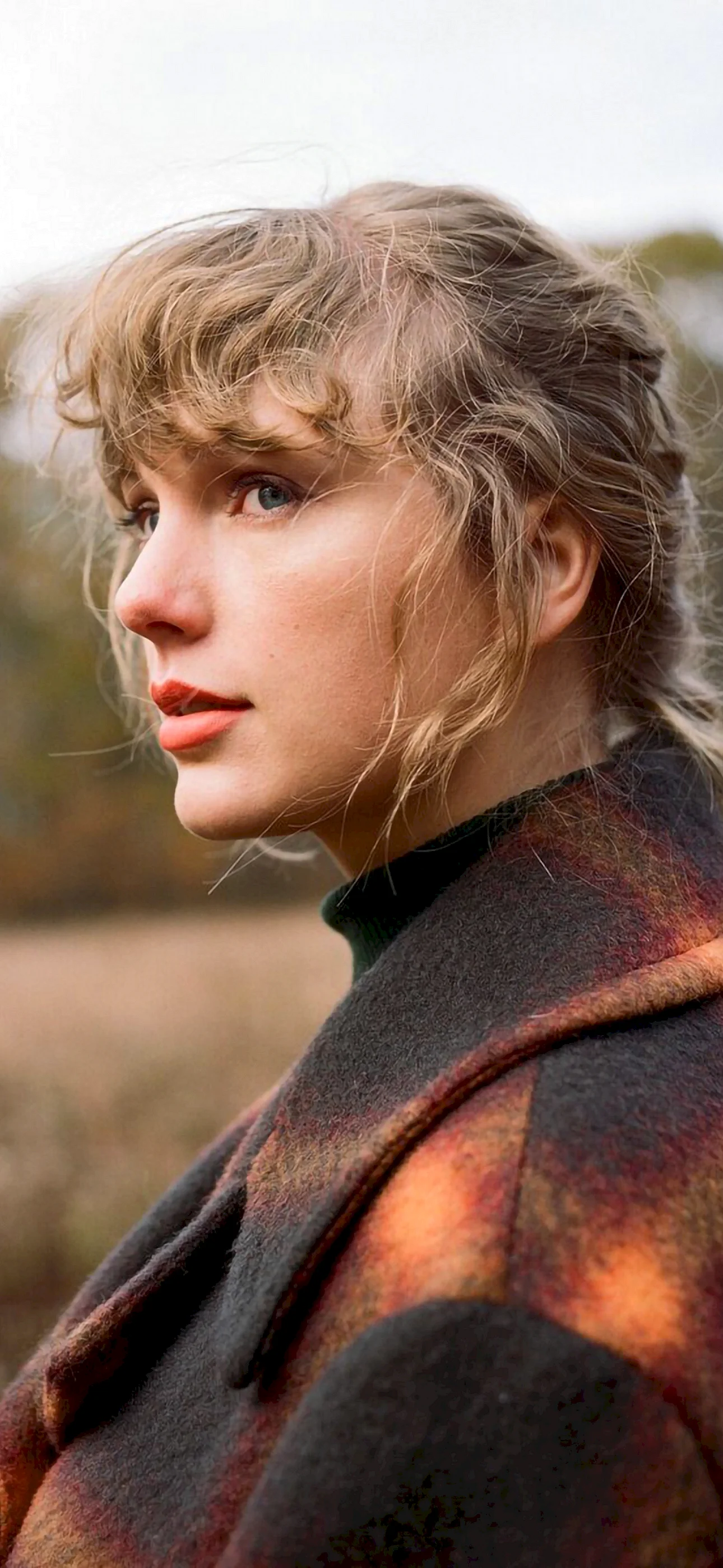 Taylor Swift Evermore Album Wallpaper For iPhone